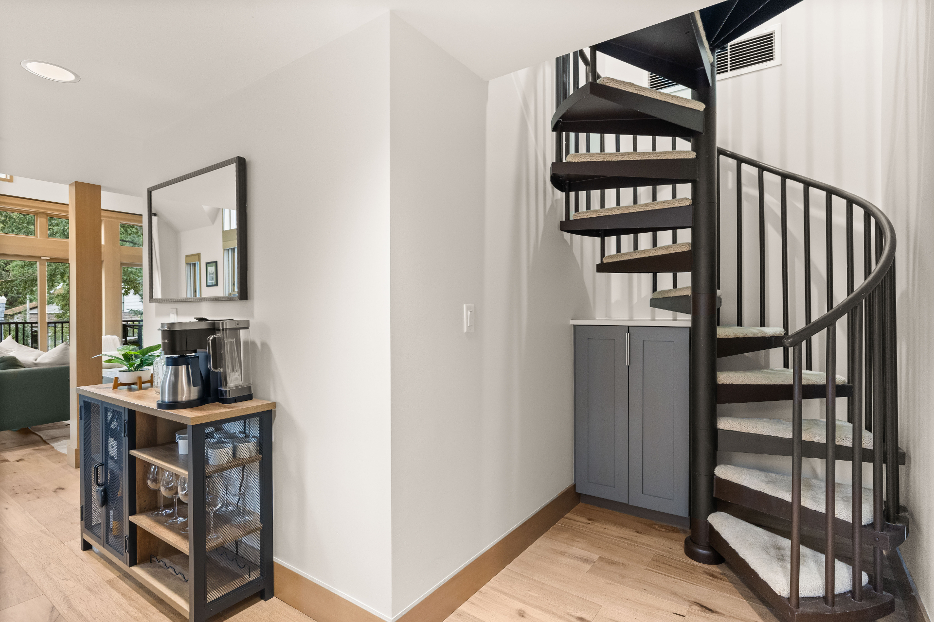 Spiral staircase and coffee bar